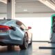 Electric car charging at station representing green car discounts