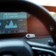 Modern telematics device tracking car driving data for insurance savings.